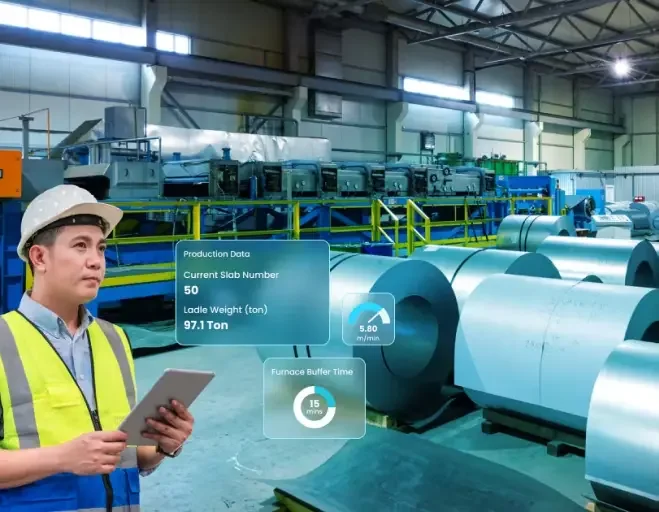 Engineer with a tablet beside steel coils, with live production figures overlaid