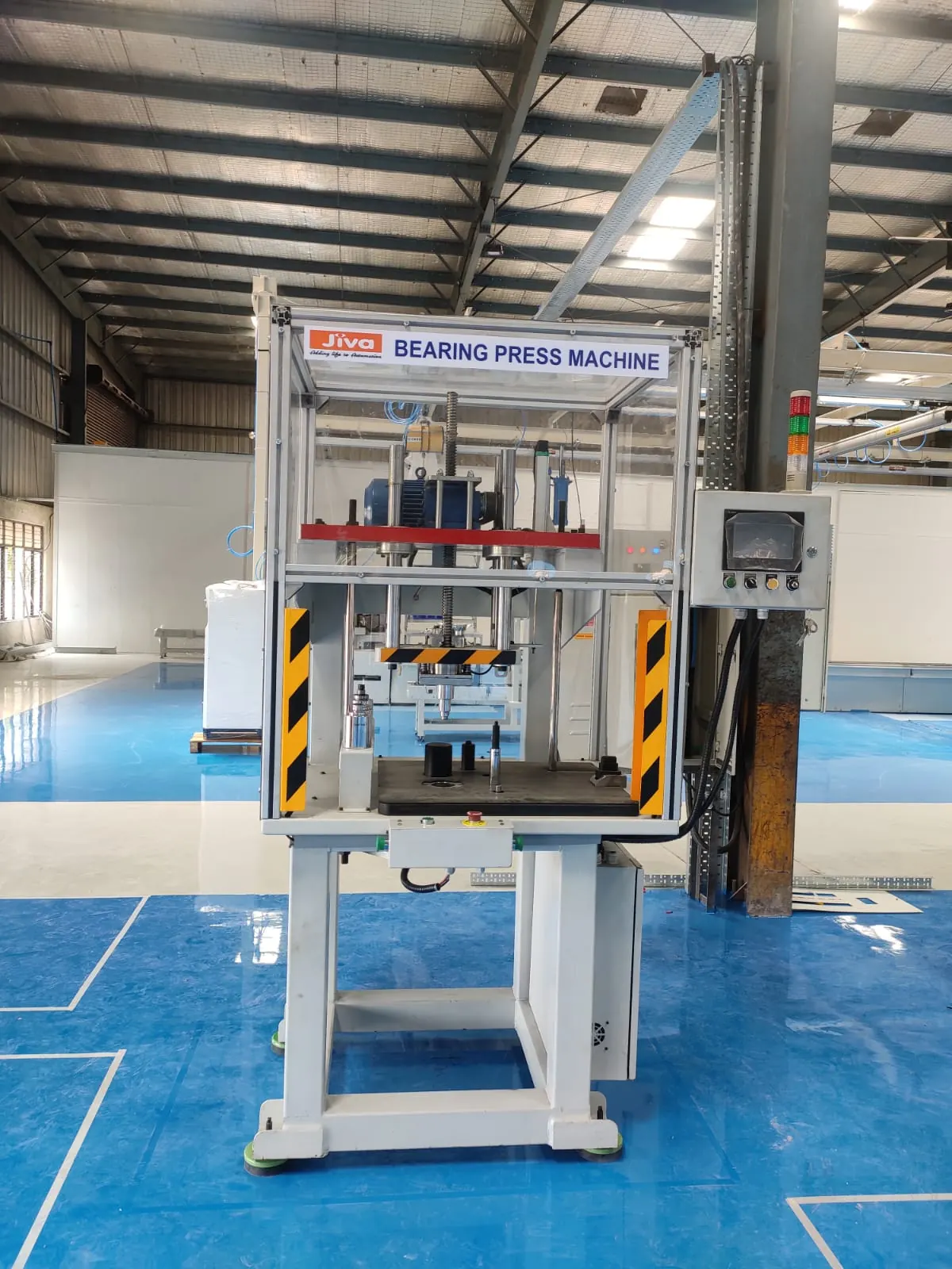JIVA bearing press machine with guarding and a touchscreen control panel
